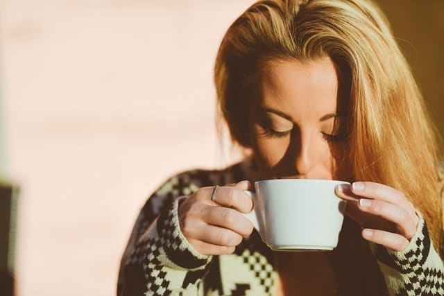 relaxed women sipping coffee at our spa