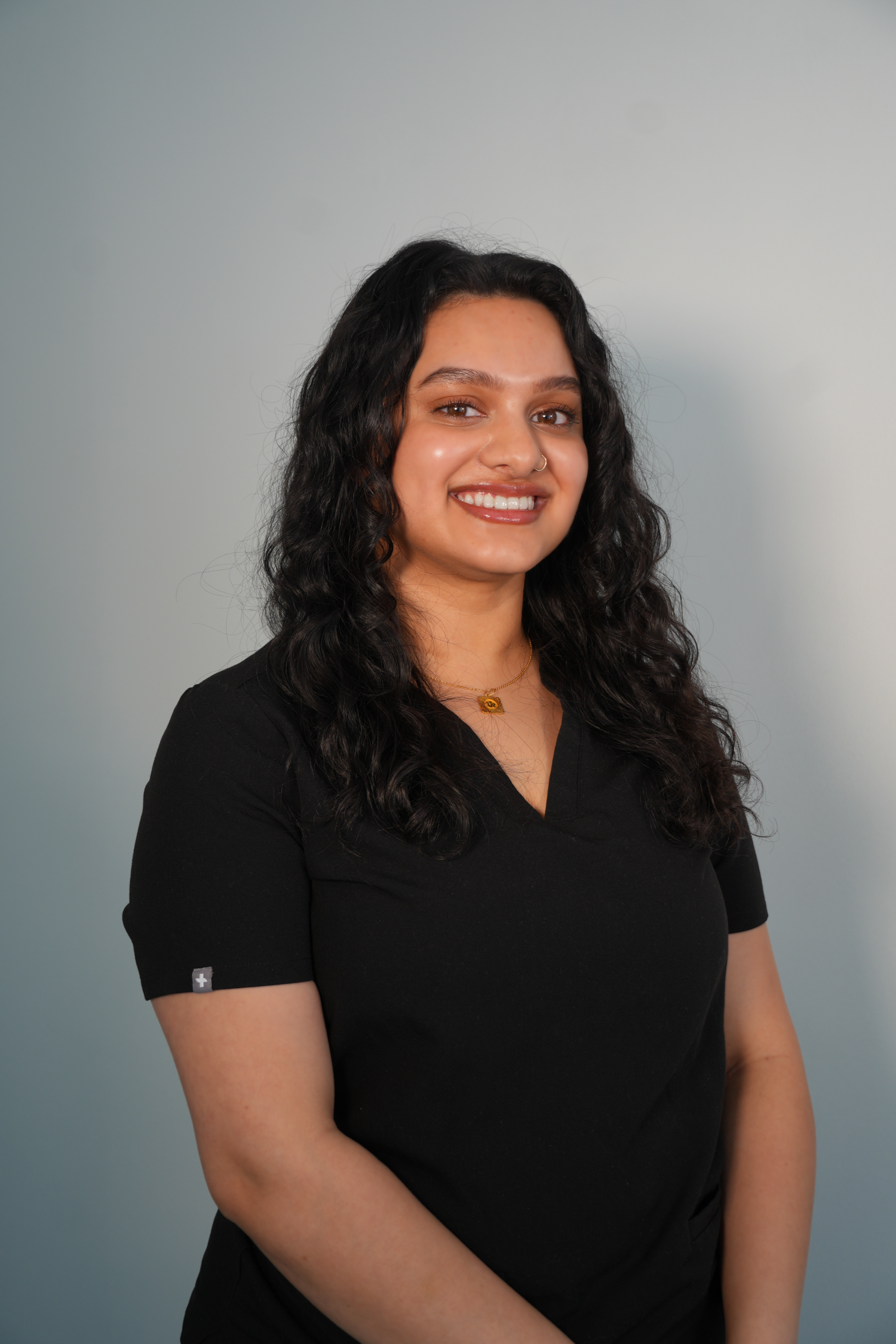Smiling woman with curly hair