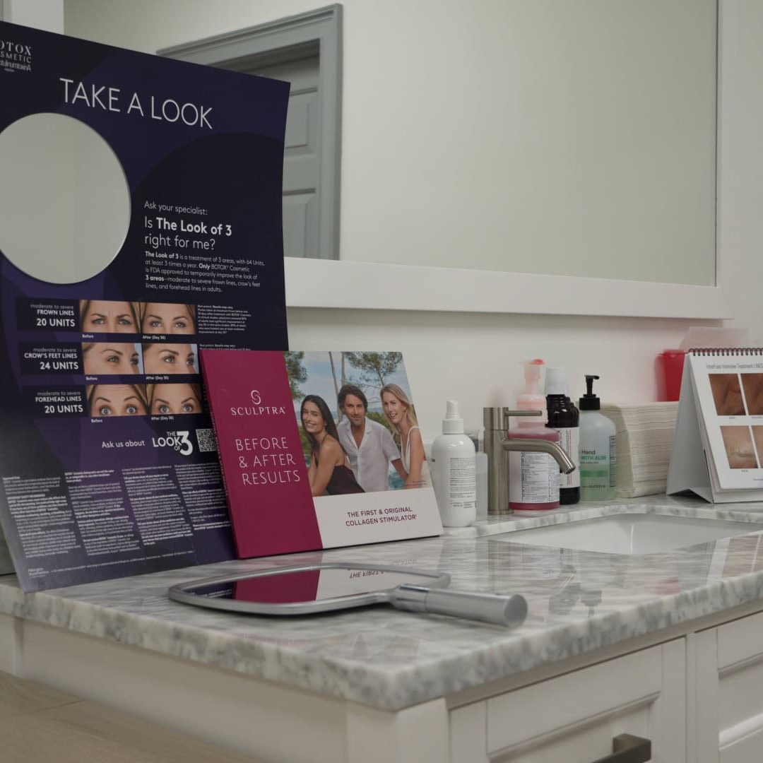 Botox and skincare products on clinic counter.